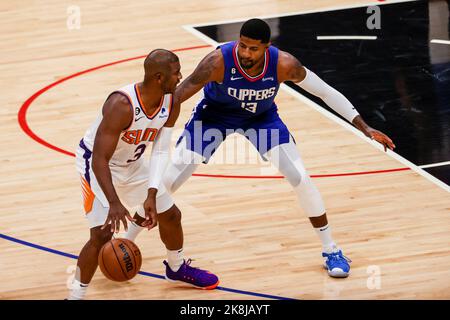 October 23, 2022, Los Angeles, California, USA: Phoenix Suns guard Chris Paul (3) is defended by Los Angeles Clippers forward Paul George (13) during an NBA basketball game between the Los Angeles Clippers and the Phoenix Suns Sunday, October 23, 2022, in Los Angeles. (Credit Image: © Ringo Chiu/ZUMA Press Wire) Stock Photo