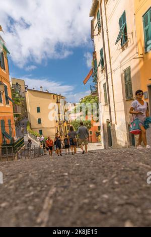 Descending Via di Loca towards the harbour of Riomaggiore one of the five villages that make up the Cinque Terre region of Northern Italy. September 2 Stock Photo