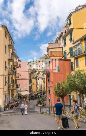 Descending Via di Loca towards the harbour of Riomaggiore one of the five villages that make up the Cinque Terre region of Northern Italy. September 2 Stock Photo