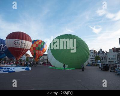 Sint Niklaas, Belgium, September 04, 2022, Hot air balloons are inflated at the market of the city of Sint Niklaas Stock Photo