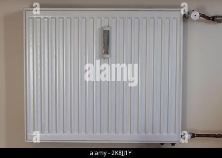 Panel steel radiator for heating installed in the apartment Stock Photo