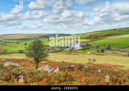 A lovely rural autumnal scene on Bodmin Moor, Cornwall. The landscape is warmed by the russet colour of the bracken and greenery of distant pastures. Stock Photo