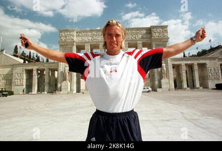 Athens, Greece 19970804: Geir Moen is ready to show muscle in the 200 meter World Cup that starts in Athens during the athletics World Cup, here is Geir with venerable old Panathinaikon stadium in the background, where the opening ceremony took place. Scan photo: Erik Johansen / NTB Stock Photo