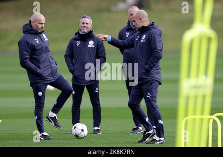 Manchester City manager Pep Guardiola with assistant Enzo Maresca (left) during a training session at the City Football Academy, Manchester. Picture date: Monday October 24, 2022. Stock Photo