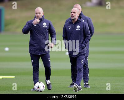 Manchester City manager Pep Guardiola with assistant Enzo Maresca (left) during a training session at the City Football Academy, Manchester. Picture date: Monday October 24, 2022. Stock Photo