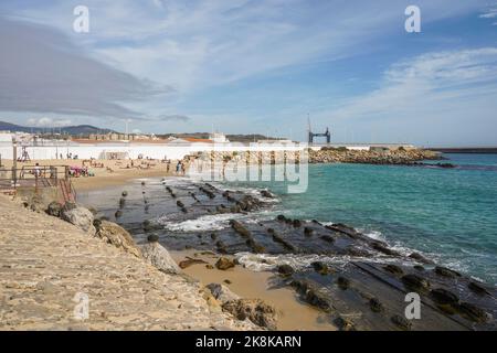 Tarifa Beach, With sunbathers at Atlantic ocean, Playa chica at Tarifa,, Andalusia, Spain Stock Photo