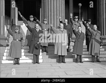 WW2 Oslo 19411025. In Norway from 1941, the Labor Service was made compulsory for men of conscripts. Here, the Defilation of the Labor Service at the University Square October 25, 1941, - Vidkun Quisling (middle, front) makes the Nazi greeting for the parade with other political leaders and higher officers. ***** Mandatory Employment Service for Norwegian Conscript Men. Military Parade October 25, 1941. Photo: Aage Kihle / NTB Stock Photo