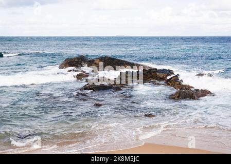 View of the sea breaking on the beach. Salvador, Bahia, Brazil. Stock Photo