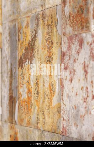 Slate stone wall tiles with vintage brown texture closeup Stock Photo