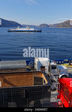 TADOUSSAC, CANADA, October 12, 2022 : Called 'traversier' in Quebec, a ferry connects La baie-Ste-Catherine to Tadoussac to cross the Saguenay fjord. Stock Photo