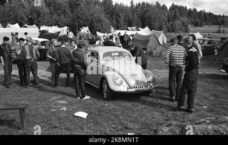 Karlskoga, August 1963, Sweden. 30 - 40,000 young people, including some raggers, take Karlskoga to look at cannon race (car race). Police are meeting strong to keep calm in the city. Here from the campsite where the youth lived in a tent. Some youth gather around a van. Photo: Ivar Aaserud / Current / NTB Stock Photo