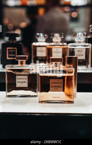 Glass golden bottles of NO.5 Chanel perfume. Is the first perfume