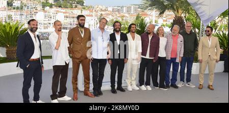 The film crew: Jalal Altawil, Tawfeek Barhom, Fares Fares, Mohammad Bakri, Ramzi Choukair, Mehdi Dehbi, Tarki Saleh, Kristina Aberg, Fredrik Zander, Makram J Khoury, Sherwan Haji Photocall of the film 'Boy from Heaven' 75th Cannes Film Festival May 21, 2022 Stock Photo