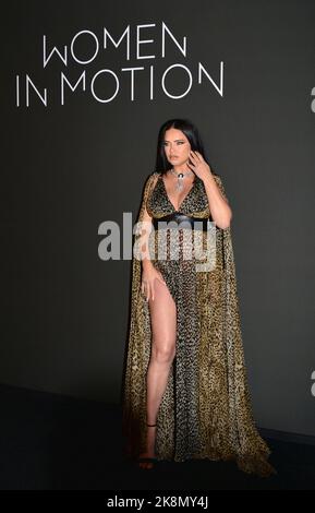 Adriana Lima (dress by Roberto Cavalli) Photocall of the Kering "Women
