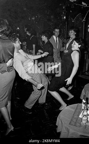 French singers Régine and Sacha Distel dancing at 'Chez Régine', located rue du Four in the 6th arrondissement in Paris. October 1961 Stock Photo