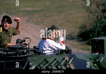 August 1990 - Princess Märtha Louise visits the Armed Forces. Here she is aboard a chariot. Tanks. Photo: Knut Falch / NTB Stock Photo