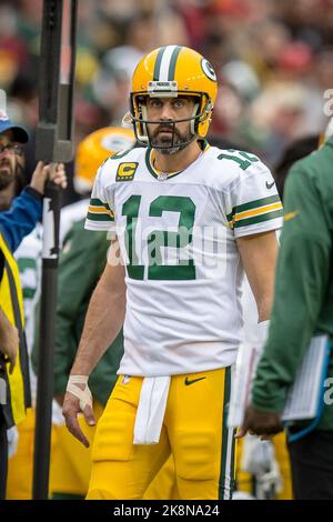 Green Bay Packer quarterback Aaron Rodgers takes a photo with Kellen  Meinke, 3, of Madison before the game against the Chicago Bears at Lambeau  Field on Sunday, Nov. 9 in Green Bay.