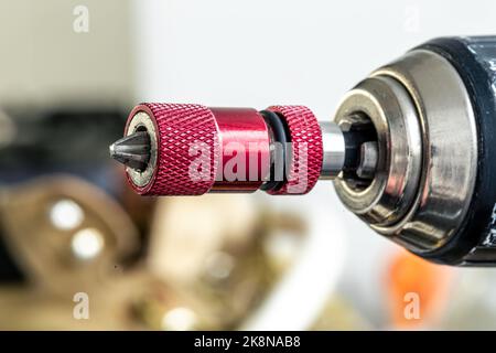 Electric drill close-up in a repair shop. Stock Photo