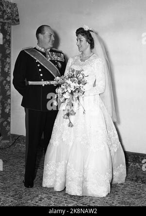 Skaugum 19610112 Princess Astrid's wedding Princess Astrid poses at Skaugum with King Olav after the wedding. Photo: NTB / NTB Stock Photo