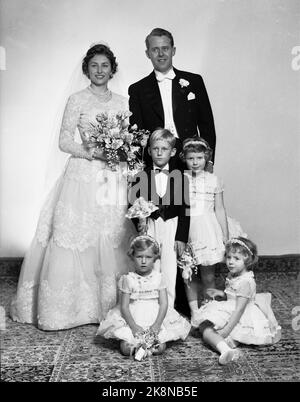 Skaugum 19610112 Princess Astrid's wedding Princess Astrid marries Johan Martin Ferner. Here, the bridal couple at Skaugum poses after the wedding, along with the bridesmaids Ingeborg Lorentzen (in front of Th) Inger Charlotte and Ellen Ragnhild Ferner who are the groom's nieces, and bridal friend Haakon Lorentzen. Photo: NTB / NTB Stock Photo