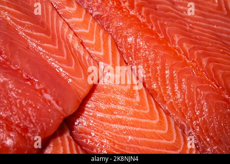 Raw salmon, trout close-up on the showcase of a seafood store. Stock Photo