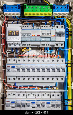 Voltage distributor with automatic switches. Electrical background. Stock Photo