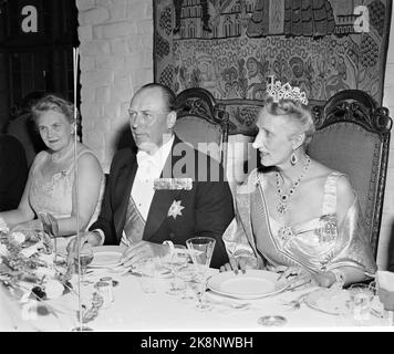 Oslo 19530702. Crown Prince Olav 50 years. Here from the government's dinner at Akershus castle. (Ex.) Mrs. Torp, Crown Prince Olav and Crown Princess Märtha in Galla dress with diadem. Photo: Jan Stage NTB / NTB Stock Photo