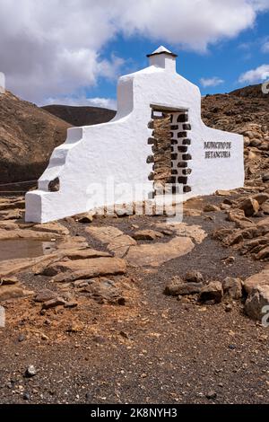 Traditional municipality sign near Betancuria village with desert landscape in the background, Fuerteventura, Canary Islands, Spain Stock Photo
