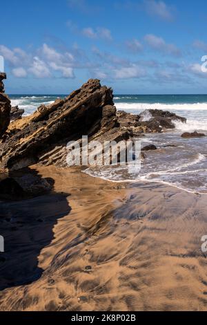 Wave patterns on the black sandy beach, Fuerteventura, Spain Stock Photo