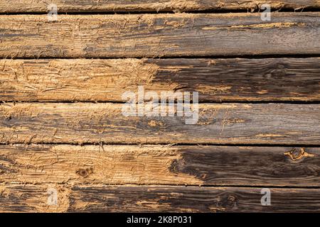 Surface of old brown chipped and deteriorated wood texture Stock Photo