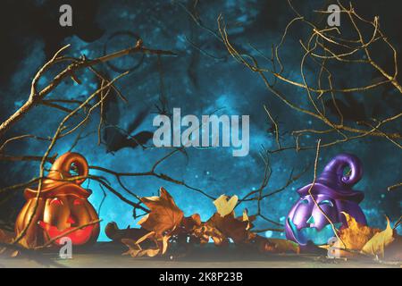 Halloween design with pumpkins head jack lantern in forest with scary black trees, old leaves, spiders and bats. Jack O' Lanterns in graveyard in spoo Stock Photo
