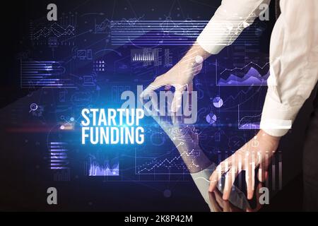Businessman touching huge screen concept Stock Photo