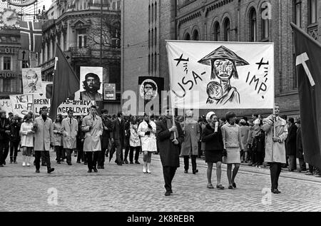 Oslo 19690501 1 May Demonstrations in Oslo. Here's the first May train on the way past the Storting. Poster with the text 'USA / IMP' Photo: / NTB / NTB Stock Photo