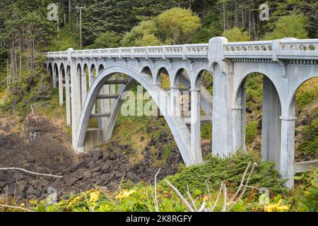Conde B McCullough designed Ben Jones Bridge near Depoe Bay Oregon also known as Rocky Creek Bridge with concrete arch Stock Photo