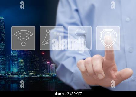 man touches the icon of protection of cloud technology data storage, network, wi-fi, the concept of safety of network and internet services Stock Photo
