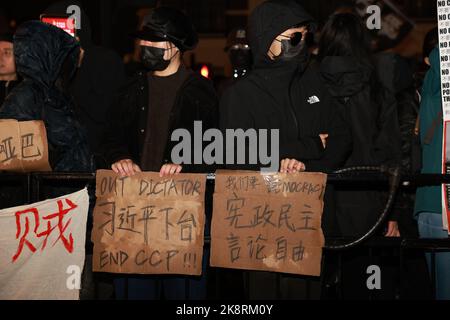 London, UK. 24th Oct, 2022. Protesters seen holding placards expressing their opinion during the demonstration. Hundreds of people marched from Downing Street via Chinatown to the Chinese Embassy in London, to protest against the assault incident in which a Hong Kong protester Bob Chan, who was seen being pulled into the grounds of a Chinese consulate in Manchester and beaten by staff on October 17, 2022. Credit: SOPA Images Limited/Alamy Live News Stock Photo