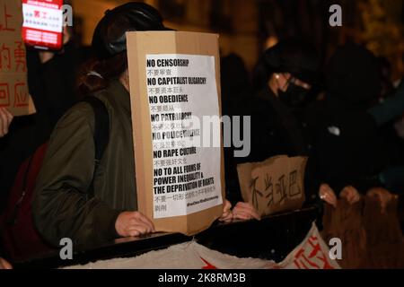 London, UK. 24th Oct, 2022. Protester seen holding a placard during the demonstration. Hundreds of people marched from Downing Street via Chinatown to the Chinese Embassy in London, to protest against the assault incident in which a Hong Kong protester Bob Chan, who was seen being pulled into the grounds of a Chinese consulate in Manchester and beaten by staff on October 17, 2022. Credit: SOPA Images Limited/Alamy Live News Stock Photo