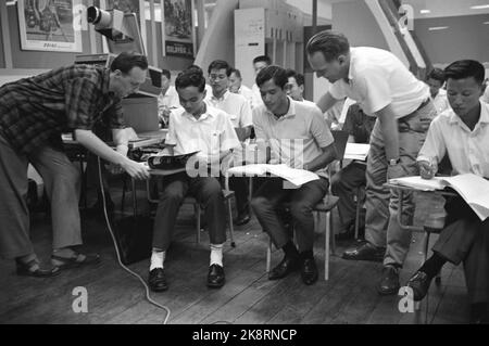 Bangkok June 5, 1965, Thailand. For 5 years, the airline SAS has built up Thai Airways International Ltd (Thai International) in Thailand, for mutual joy and benefit. The company has three caravels and about 700 employees of which 37 Scandinavians. Here SAS instructors Wilhelmsson and Freij from Stockholm who are a tour of Thailand to train the Thai people who after a while get further courses in Stockholm. Photo: Sverre A. Børretzen / Current / NTB Stock Photo