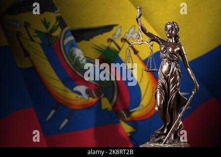Ecuador flag with statue of lady justice and judicial scales in dark room. Concept of judgement and punishment, background for jury topics Stock Photo