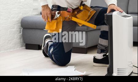 Air purifier service. Maintenance the air filter. Replace and clean the air filter. The filter have a lot of dust. Stock Photo