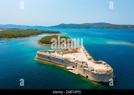 Aerial view about St. Nicholas Fortress (Croatian: Tvrđava sv. Nikole) which located at the entrance to St. Anthony Channel, near the town of Šibenik. Stock Photo