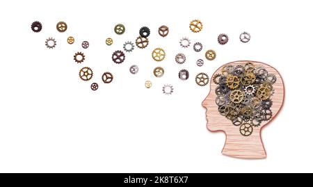 Teamwork and Leadership education symbol concept. Human head shaped with gears brain idea made of woods working together as team in working partnershi Stock Photo