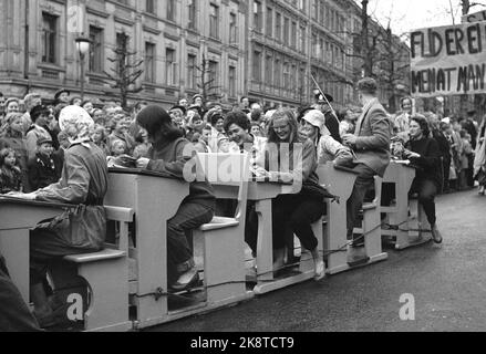 Oslo 19570517 May 17 The celebration in Oslo became a rather cool experience, but this did not dampen the Russian soles. Here Russ on interconnected school desks that are drawn through the streets of the Russian train. Photo: NTB / NTB Stock Photo