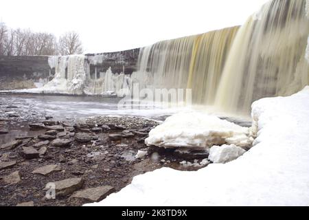 Frozen waterfall named Jagala Falls - highest natural waterfall in Estonian limestone coast Stock Photo