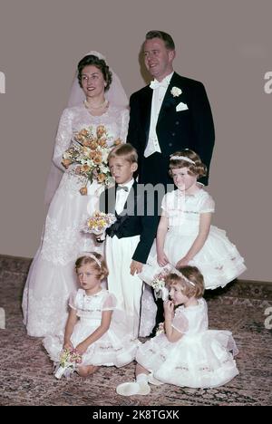 Skaugum 19610112 Princess Astrid's wedding Princess Astrid marries Johan Martin Ferner. Here, the bridal couple at Skaugum poses after the wedding, along with the bridesmaids Ingeborg Lorentzen (in front of Th) Inger Charlotte and Ellen Ragnhild Ferner who are the groom's nieces, and bridal friend Haakon Lorentzen. Photo: NTB / NTB NOTE: The picture was partially damaged by color, which is why we had to put the picture on a new background. Stock Photo