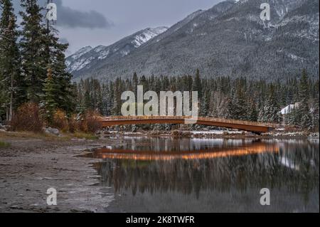 Pedestrian Bridge over the Bow River in the town of Banff in Banff National Park, Alberta, Canada Stock Photo