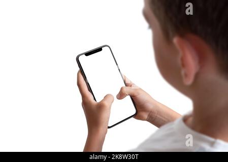 Boy holding smart phone with isolated display and background Stock Photo