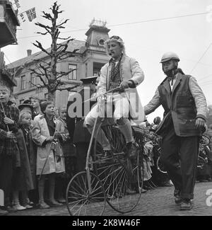 Oslo 19570517 May 17 The celebration in Oslo became a rather cool experience, but this did not dampen the Russian soles. Here is a cyclist on Velociped / Teltepetter bicycle in the Russian train. Photo: NTB / NTB Stock Photo