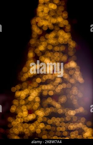 Christmas trees lights. Christmas garland blurred out. Defocused Photo. Stock Photo