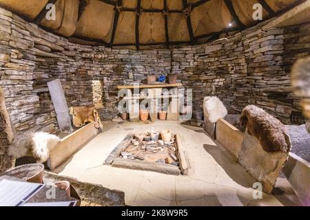 Reconstruction of a dwelling, Skara Brae, stone-built Neolithic settlement, located on the Bay of Skaill , Neolithic, Mainland, Orkney, Scotland, UK Stock Photo